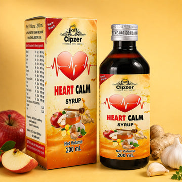Cipzer Heart Calm Syrup packaging and bottle on a yellow background with apples and ginger.